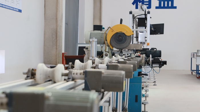 1628569945344082.jpg 图二:腕臂加工区设备_副本.jpg